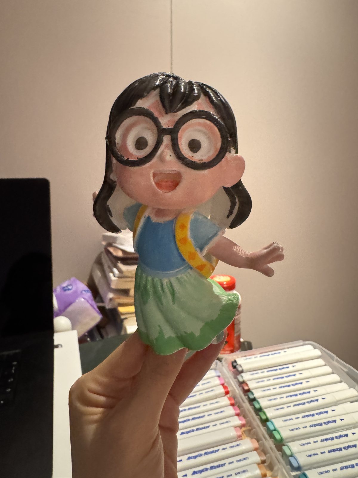 A 3D-printed and hand-painted character made by Huiling Pan