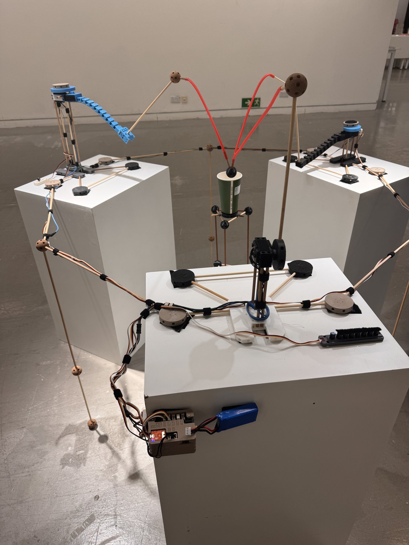 Overhead view of the installation, ball, and cup