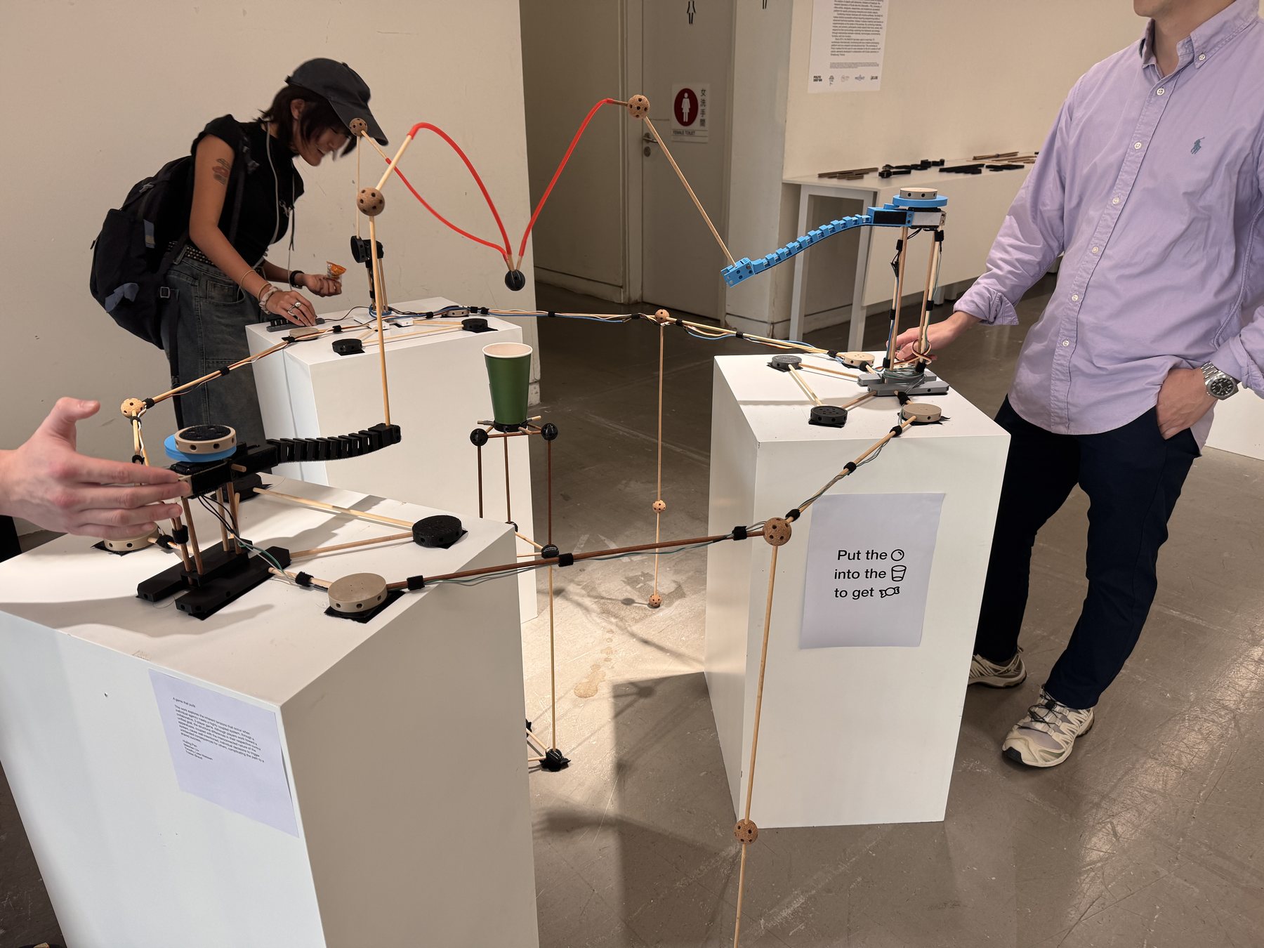 Visitors operating different parts of A game that pulls together